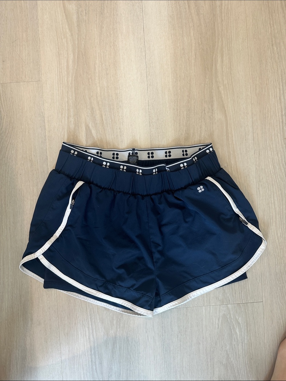 Sweaty Betty On your Mark 4in navy shorts with white trim